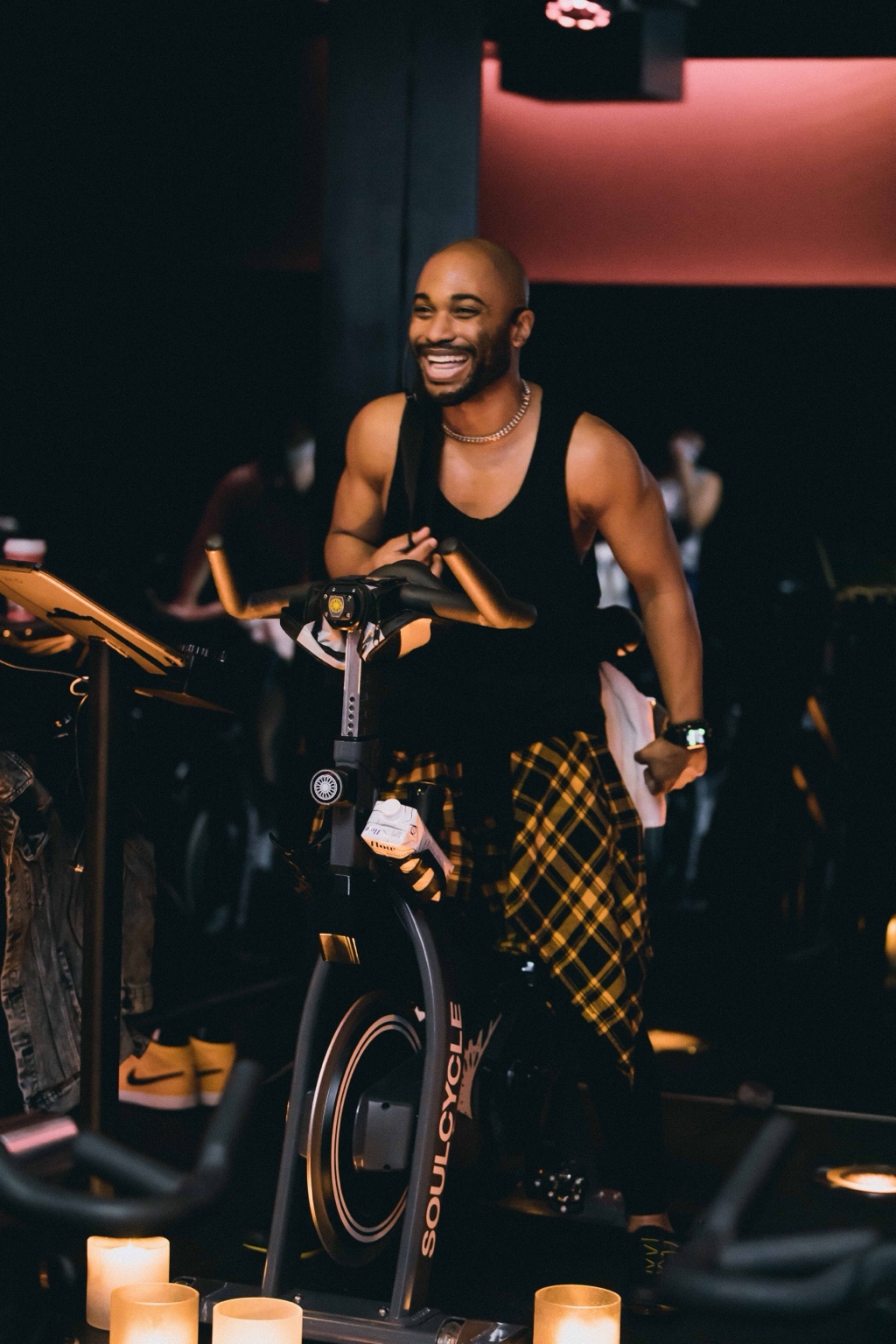 jarreau bowen laughing while teaching a SoulCycle class